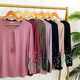 بلوز زنانه مدل منگوله دار آستین بلند طرح برجسته